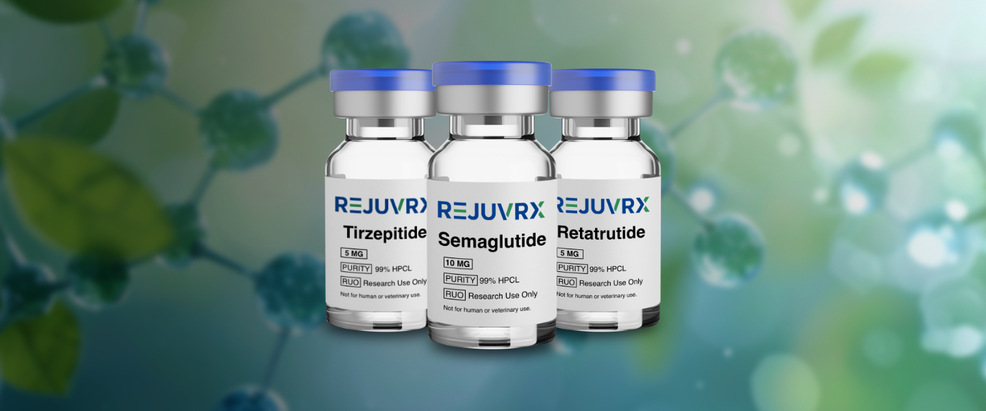 Three vials of REJUVRX on a blurred green background