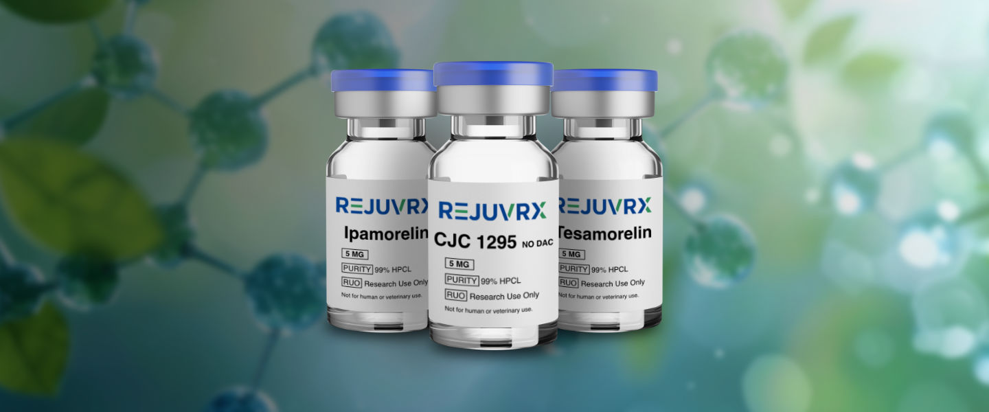 Three vials of Rejuvrx on a blurred green background