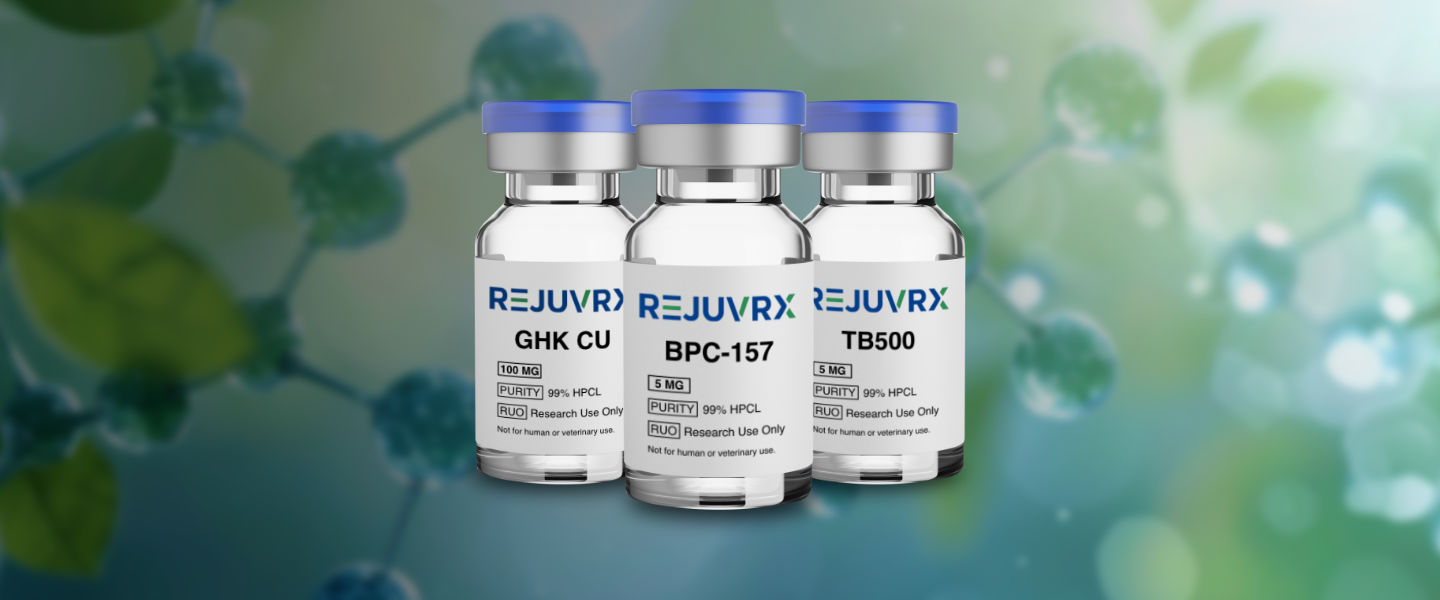 Three vials labeled 'REJUVRX' on a blurred green background
